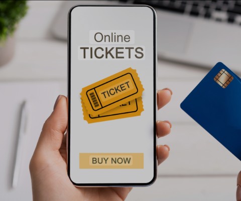 a concert e-ticket with a QR code and a dynamic seating map on a concert ticketing platform